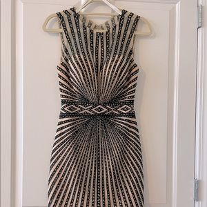 Nude and black cocktail size four only worn once jovani- worn at Miss America